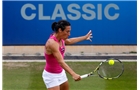 BIRMINGHAM, ENGLAND - JUNE 11: Francesca Schiavone of Italy in action against Sloane Stephens of the USA during day three of the Aegon Classic at the Edgbaston Priory Club on June 11, 2014 in Birmingham, England. (Photo by Paul Thomas/Getty Images)